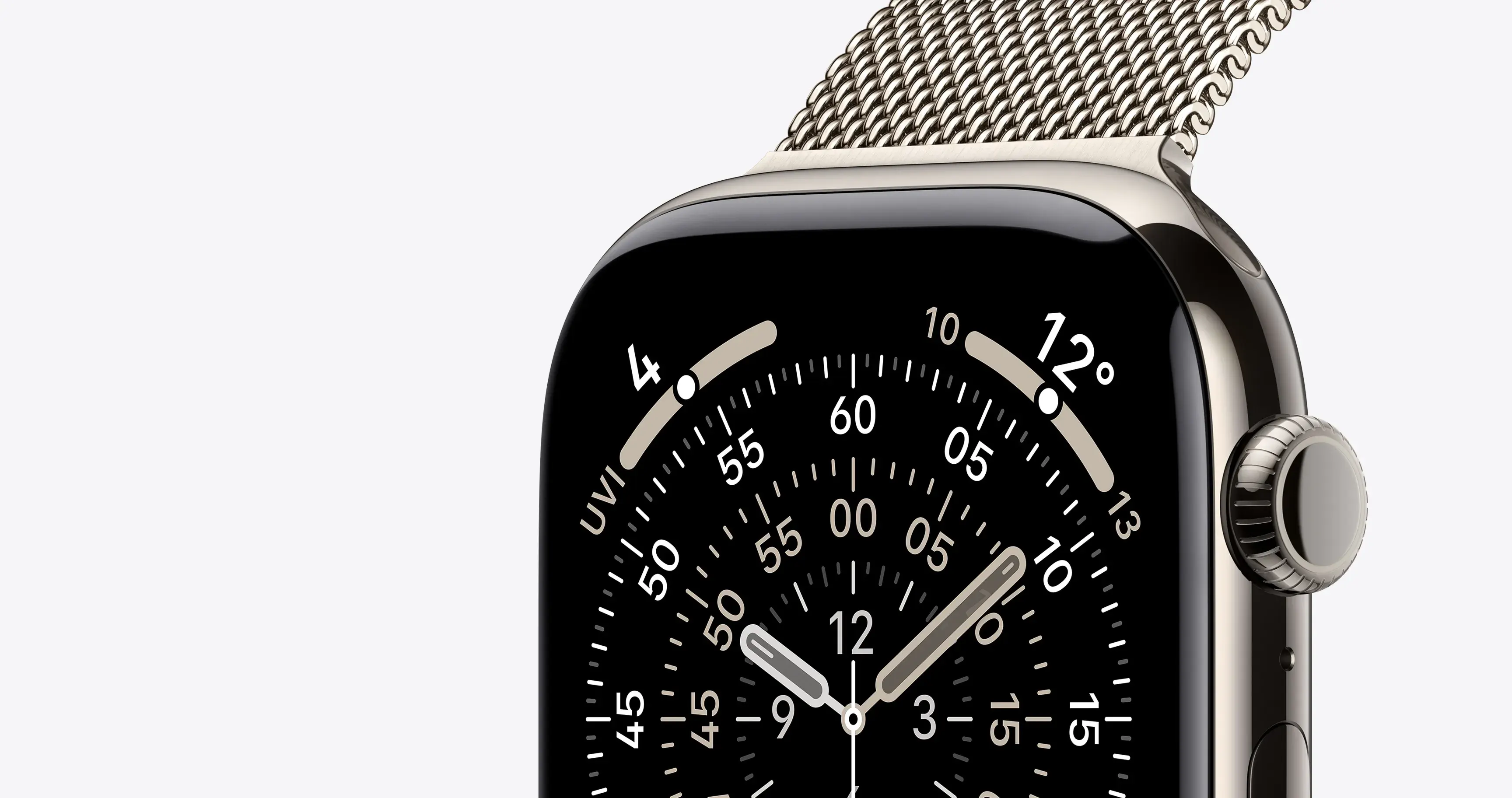 Золотистий Apple Watch із браслетом Milanese Loop: макро-вигляд корпусу та інформативного аналогового циферблата