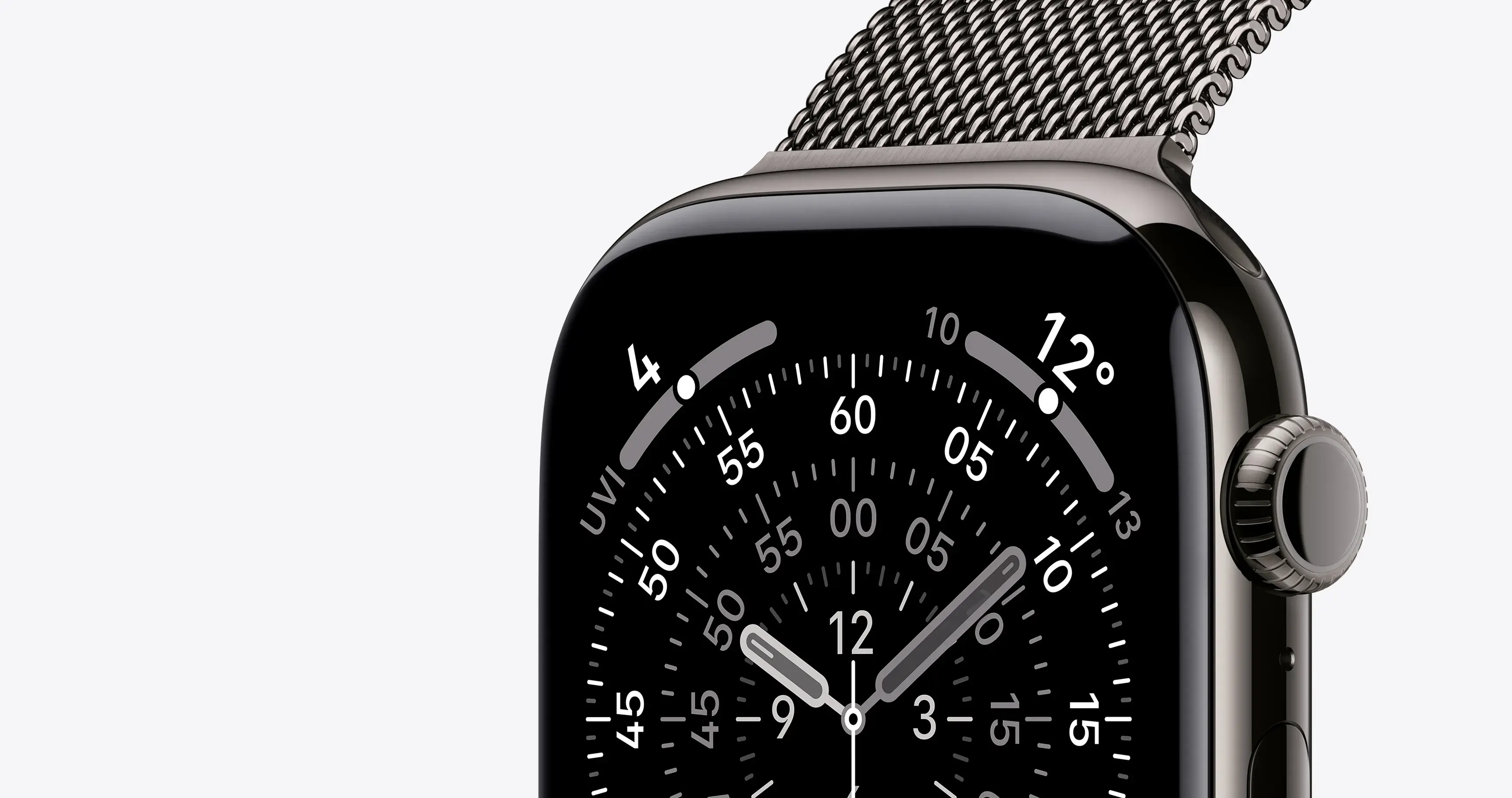 Темний Apple Watch із браслетом Milanese Loop: макро-вигляд корпусу та деталізованого аналогового циферблата