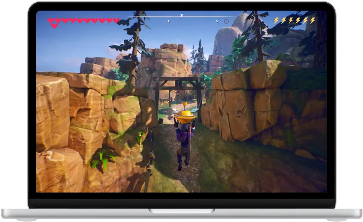 MacBook Neo, сріблястого кольору, на екрані зображено сцену з гри Oceanhorn 3