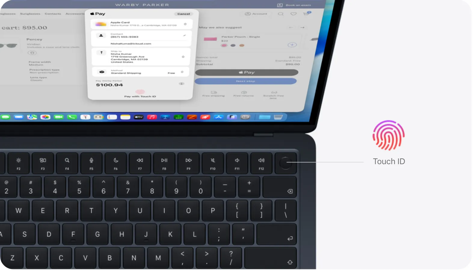Відкрийте MacBook Air, демонструючи розташування кнопки Touch ID