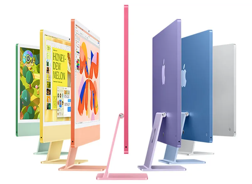 Сім iMac у різних кольорах (зелений, жовтий, помаранчевий, рожевий, фіолетовий, синій, сріблястий), розташовані в ряд