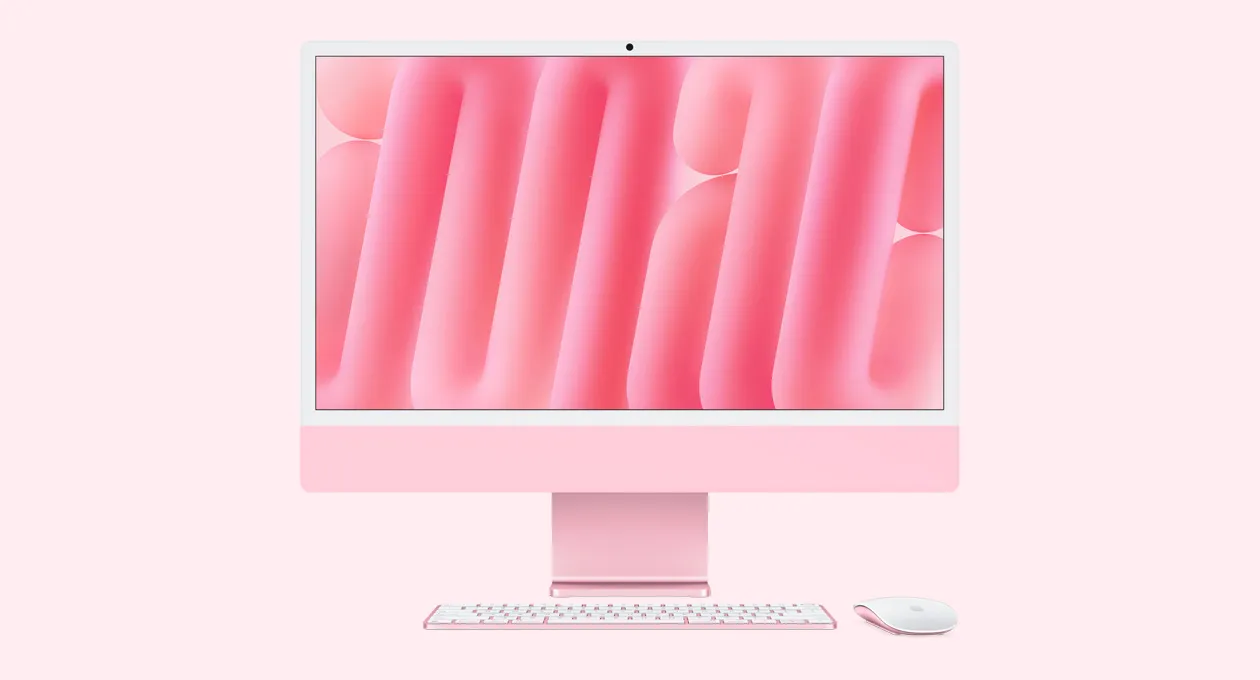 Рожевий iMac з мишею та клавіатурою в тон, вид спереду