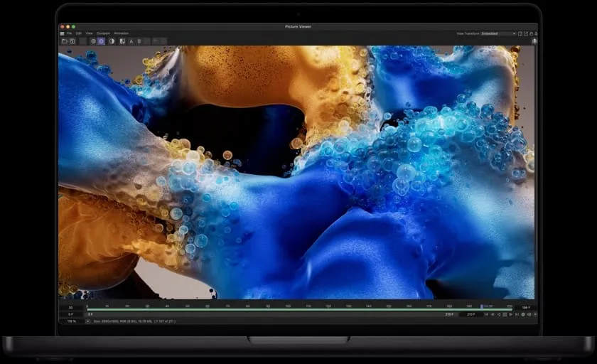 Экран MacBook Pro с анимацией пузырей, созданной с помощью Cinema 4D