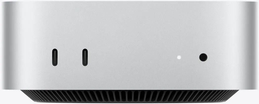 Вид спереду на сріблястий Mac mini з портами на передній панелі: два порти USB-C та порт 3,5 мм для навушників